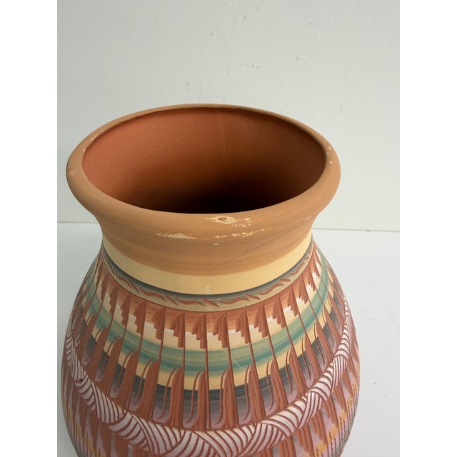 Artist: Ernie Watchman (Navajo) Origin: American Southwest Date: Late 20th century Materials: Hand-coiled and hand-painted...