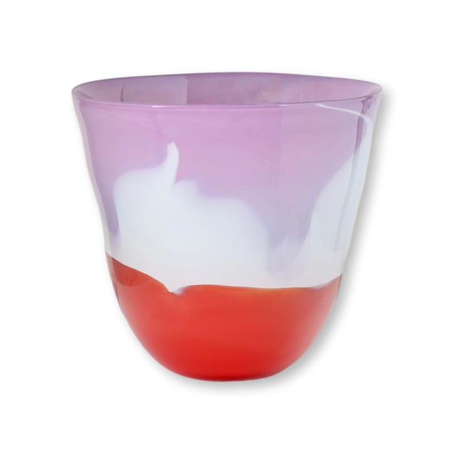 Striking handblown art glass vase titled "Arizona Sunrise" by American studio glass artist George Averbeck. This...