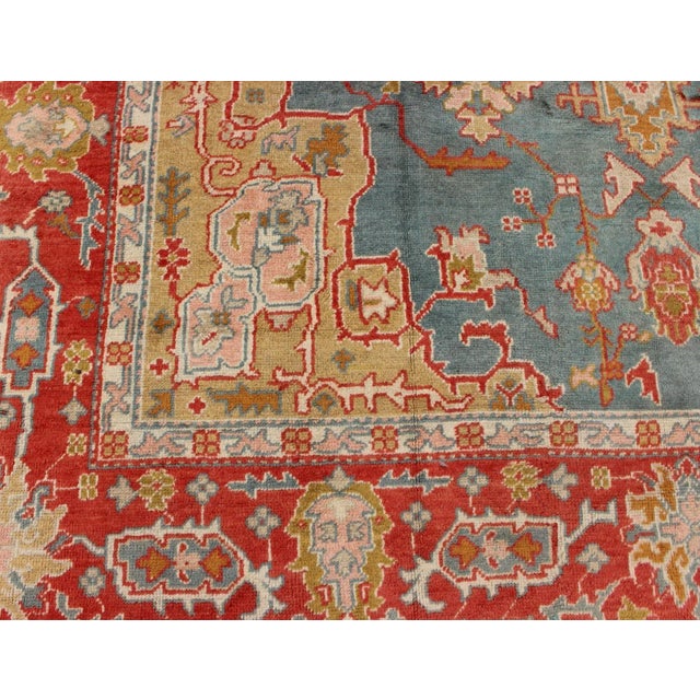 Antique Turkish Oushak Rug on a Blue Background and Orange-Red Color Border For Sale - Image 9 of 12