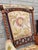 A striking late-19th-century George Hunzinger platform rocking chair featuring his distinctive “lollipop” circular motifs,...