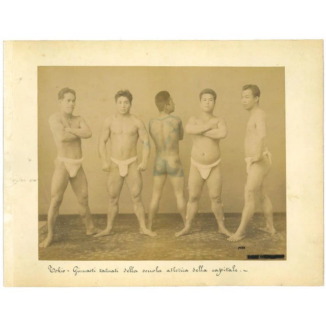 Ancient Portrait of Japanese gymnasts is an original vintage albumen print on single cardboard: 26 x 34 cm. Realized...