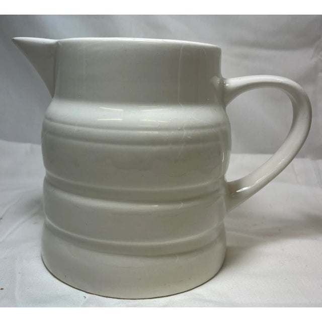 Vintage White Ironstone Pitcher /Jug Made in England - Circa 1960’s Measures 7 1/2” W x 5” D x 5 3/4” T