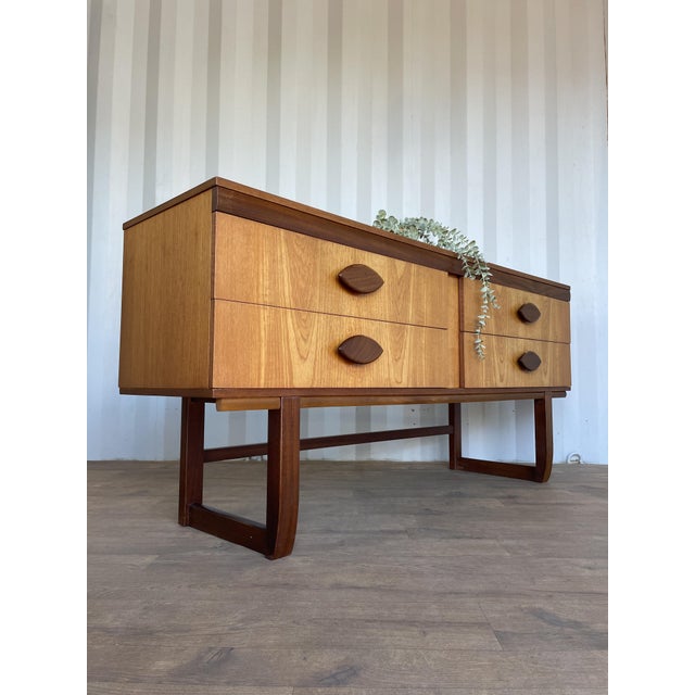 Mid-Century Modern Teak Sideboard with Sculpted Handles, 1960s, in Very Good conditions. Designed 1960 to 1969