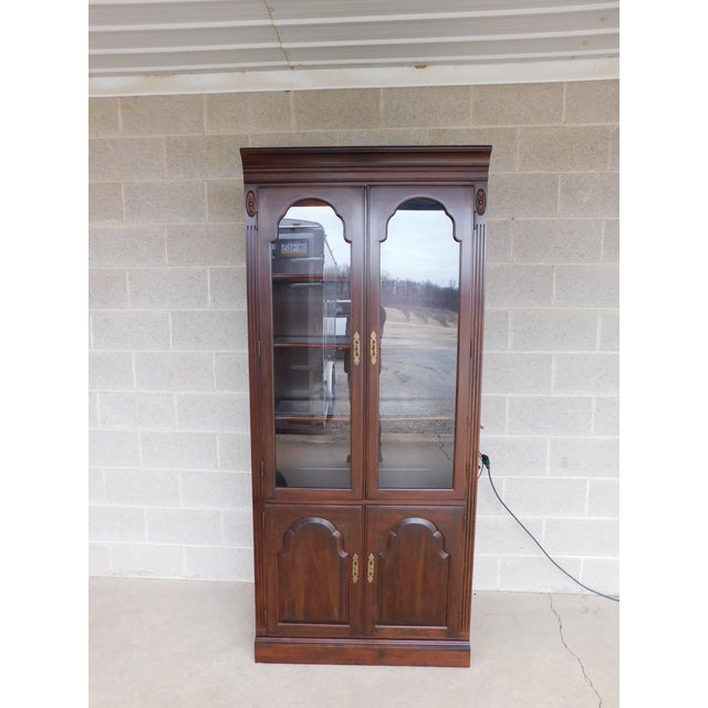 Ethan Allen Georgian Court Cherry Display Lighted Wall Cabinet 119210 Description: Features quality crafted solid...
