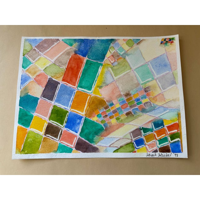 Signed Sarah Steckel ‘98. A colorful abstract patchwork in watercolor.