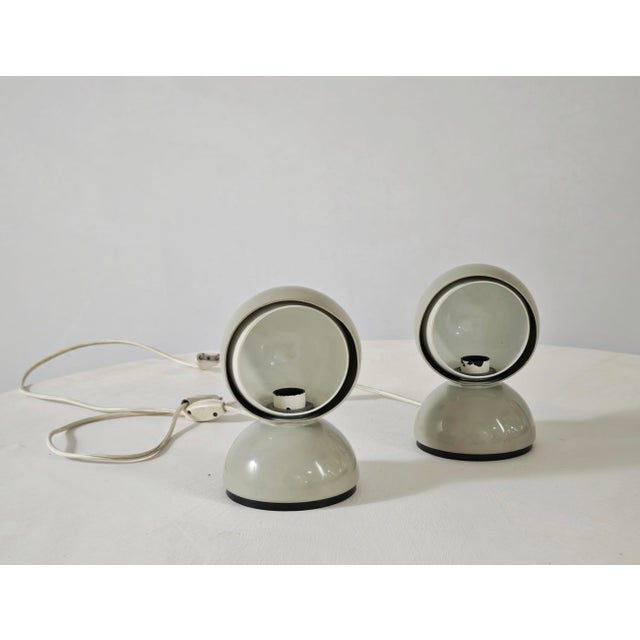 Set of two famous Eclisse table lamps, a masterpiece of Italian Space Age design created by Vico Magistretti in 1965 for...