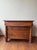 This 19th Century French Empire Buffet showcases refined craftsmanship with its elegant lines and rich walnut wood finish....