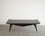 Inspired by the iconic Italian modernism of Ico Parisi, this sculptural coffee table embodies the elegance and fluidity of...