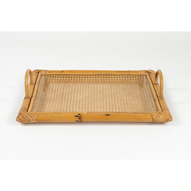 Midcentury rectangular amazing serving tray in bamboo, rattan with handles in the style of Christian Dior Home. Made in...