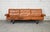 Vintage three-seat DS-31 sofa produced by De Sede in Switzerland during the 1970s. The sofa is upholstered in rich cognac-...