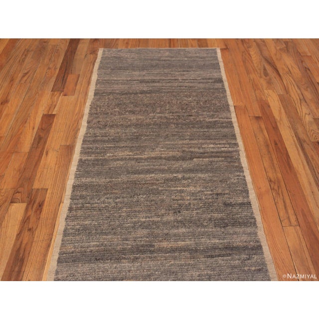 A Decorative Neutral Earthy Grey Minimalist Solid Abstract Modern Hallway Runner Abrash Rug, Country of Origin: Central...