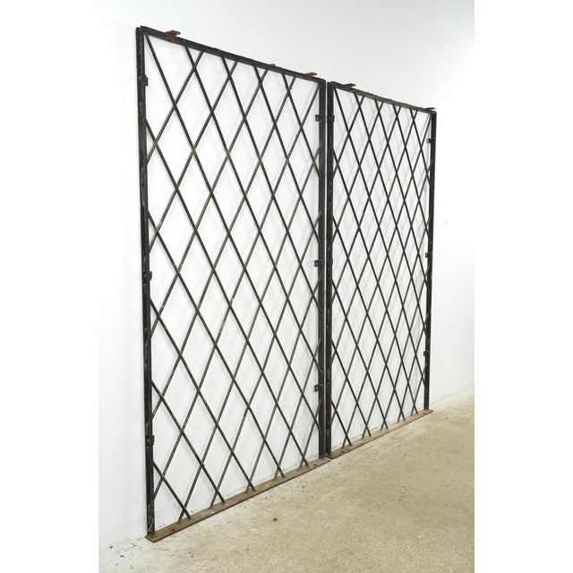 Industrial Pair of Reclaimed Industrial Wrought Iron Security Panels 36.75 X 64.375 In. For Sale - Image 3 of 9