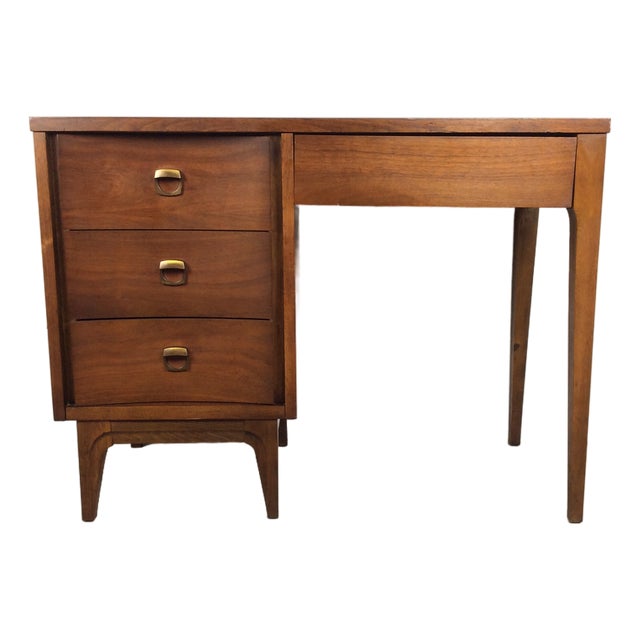 Mid Century Modern Four Drawer Writing Desk With Curved Drawer Fronts and Brass Hardware For Sale