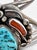 Bold 1970s Navajo sterling silver cuff featuring Sleeping Beauty turquoise, coral, and mother of pearl in a sculptural...