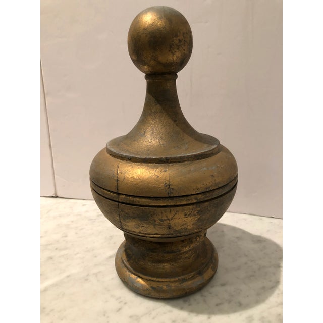 Decorative Antique finial in new gilt finish. Great on a bookshelf or resting on a stack of books.