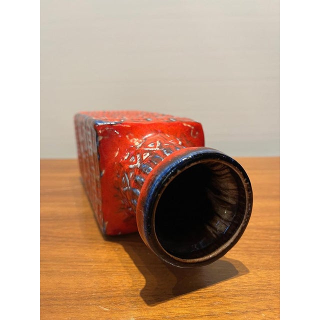 This is a classic must-have for any West Germany pottery collector. This beautiful vase was produced in the second half of...