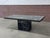 Postmodern Italian dining table in verde marble, late 20th century. Rectangular slab top in richly veined marble, showing...