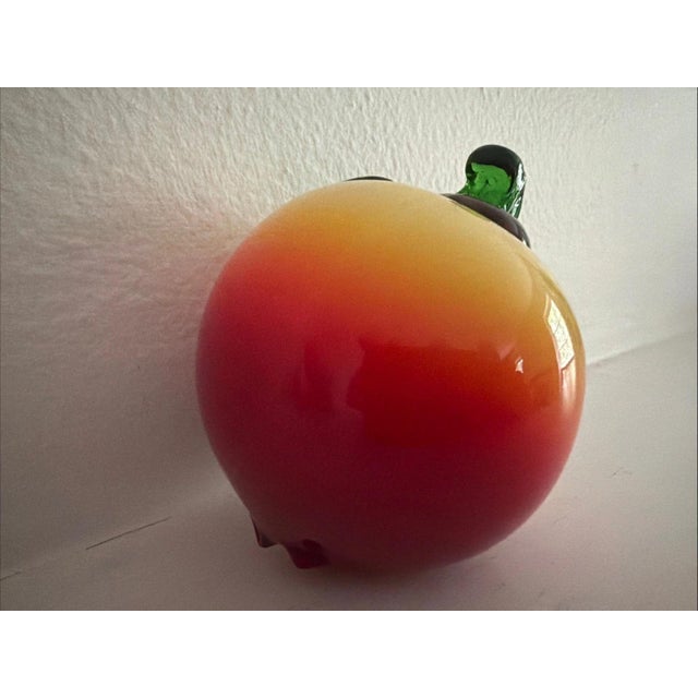 This Vintage Murano Style Hand-Blown Glass Art Glass Peach figurine is a stunning piece of decorative pottery and...