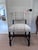 This dark walnut chair is absolutely antique, although I do not know its origins. It's handsome proportions and strong...
