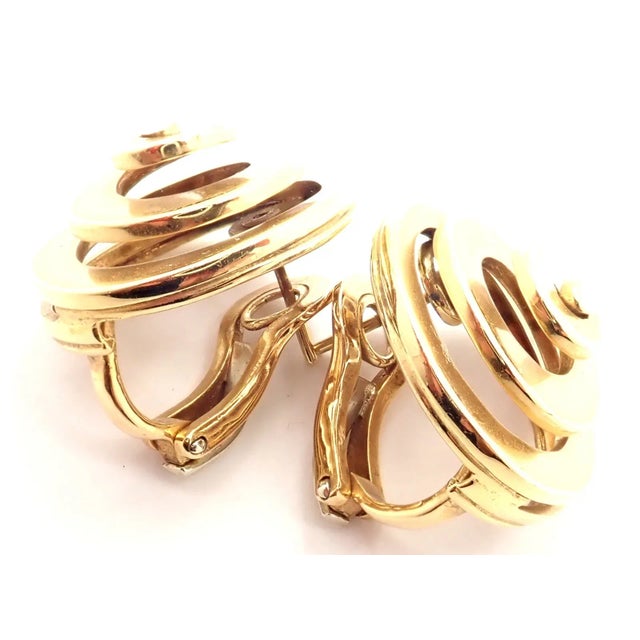Vintage BULGARI BULGARI 18k Yellow Gold Swirl Earrings Metal: 18k Yellow Gold Measurements: 21mm Weight: 18.4 grams These...