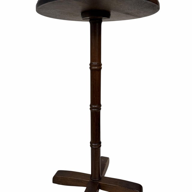 Vintage round faux bamboo wooden pedestal side table. Sits sturdy. Light weight for easy placement. Measures 12” diameter...
