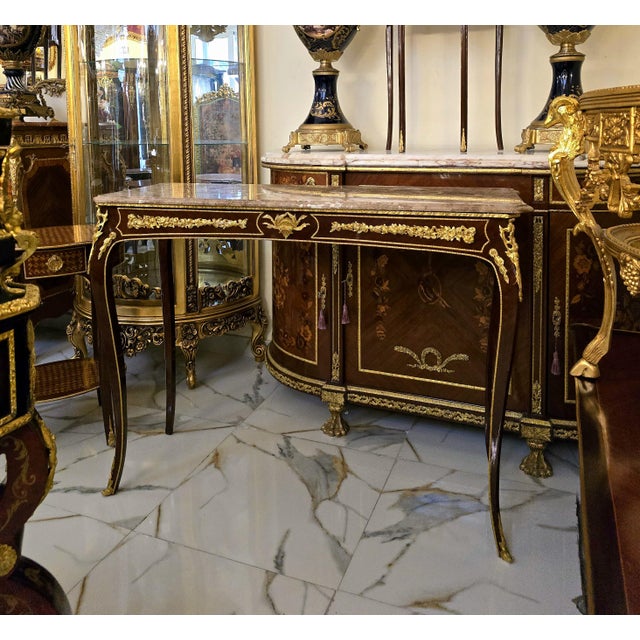 Add timeless sophistication to your interior with this beautifully handcrafted Rococo-inspired console table, designed...