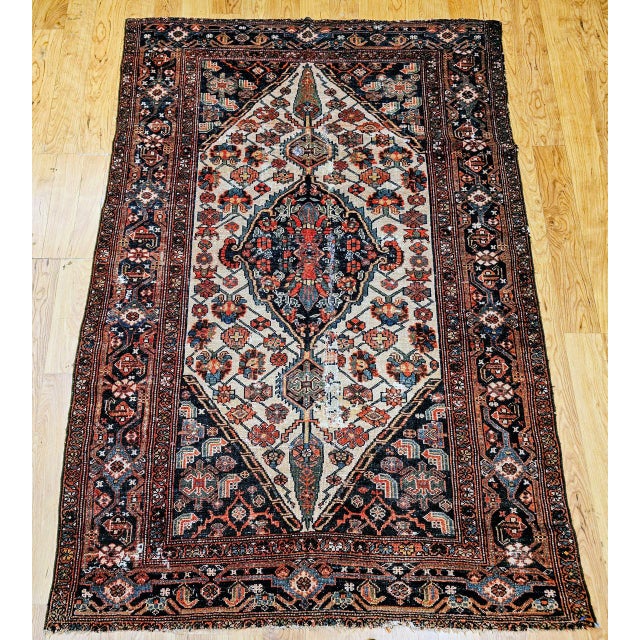 "An exquisite late 19th century Persian Malayer village rug of great elegance and refinement, showcasing the artistry of...