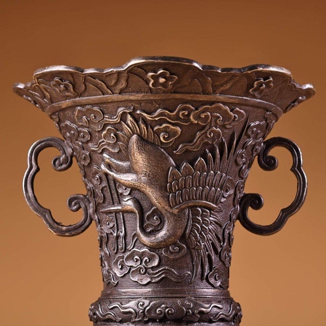 This stunning piece, often used as an altar vase or "flower drum" (Huagu), is masterfully crafted from heavy solid...