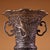 This stunning piece, often used as an altar vase or "flower drum" (Huagu), is masterfully crafted from heavy solid...