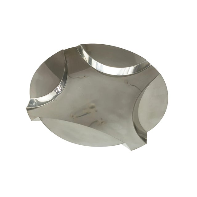 This sculptural centerpiece was manufactured in steel and produced by Robots, Milano. It remains in a pretty good...