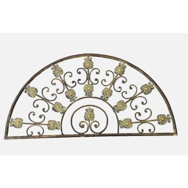 French architectural demilune iron grille with great patina. Good quality iron work. Also perfect to use as decorative...