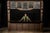 Monumental Gothic Revival architectural bar front executed in wood with an elaborate arrangement of stained and textured...