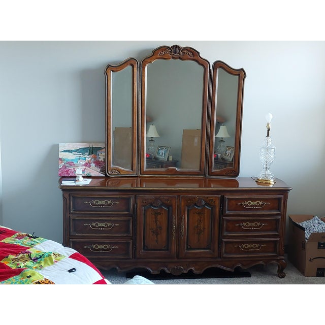 Elevate your home with this stunning statement piece from the iconic Brittany Collection by Drexel Heritage. This dresser...