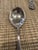 Towle sterling silver sugar spoon in the Georgian pattern, patented 1898. It has an engraved stylized script monogram "A"...