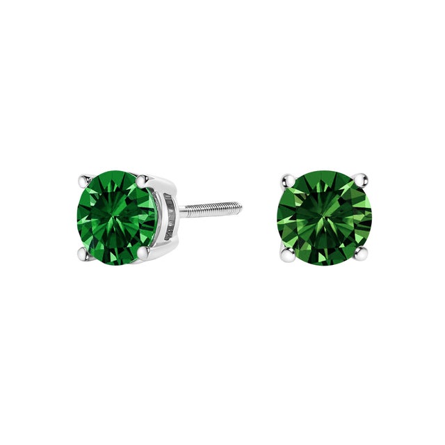 Embrace timeless elegance with these exquisite 14K white gold solitaire stud earrings, each featuring a 1.0 carat lab-...