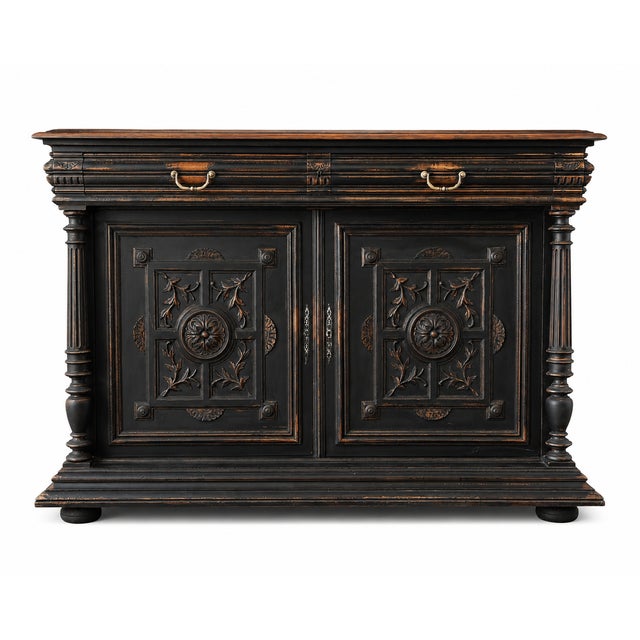 An impressive late 19th Century French Renaissance Revival sideboard, crafted in solid walnut with an ebonised finish and...