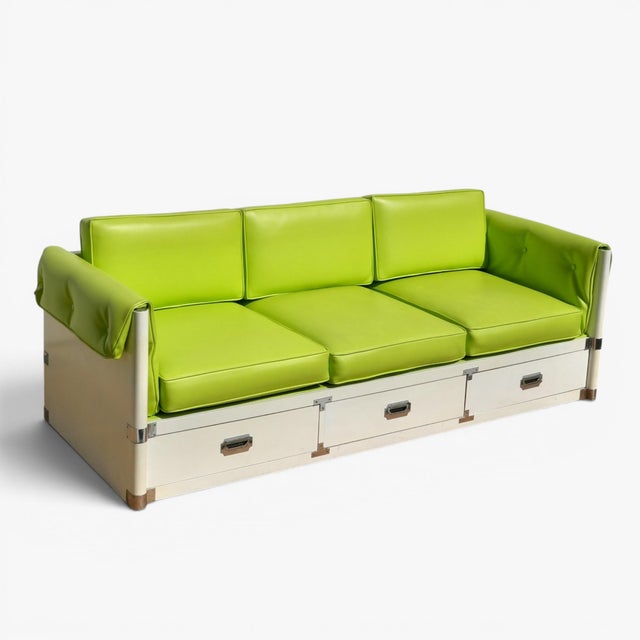 White laminate base with chrome hardware and dovetail jointed drawers. Three seat sofa has three storage drawers, lime...