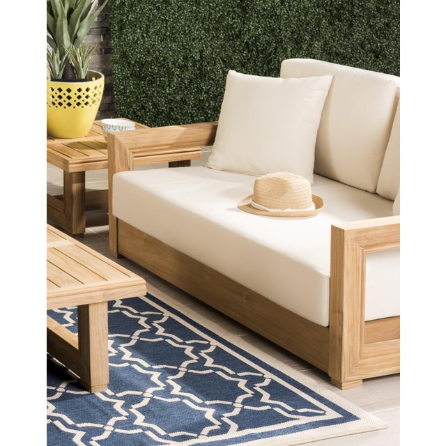 Sit Down, Relax And Unwind In This Cozy Brazilian Teak 2-Seat Bench. Designed With Sleek Contemporary Geometric Arms And...