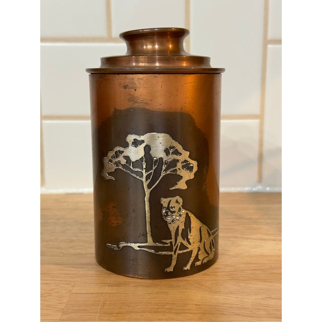 This rare vessel, designed by Otto Heintz. Hand forged in bronze copper & sterling silver. A Staffordshire terrier sits...