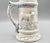 Large statement size lidded drinking stein depicting a hunter, dog, and a stag with lovely detail. It is 13 inches in...