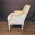 Elegant pair of 19th century French Louis XVI painted bergère chairs, newly upholstered in a refined neutral fabric. The...