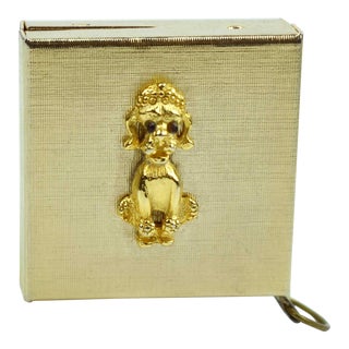 Mid 20th Century Gold-Tone Metal Small Tape Measure With Poodle Dog Design For Sale