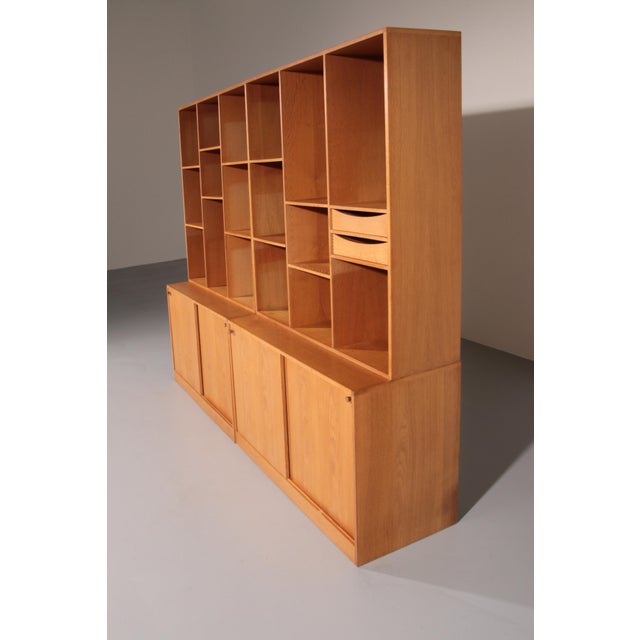 A beautiful and authentic Danish mid-century wall unit designed by renowned Danish designer Kurt Østervig and manufactured...