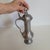 A well-proportioned German or Austrian pewter flagon dating, circa 1880–1910, with a tall, tapering neck rising from a...