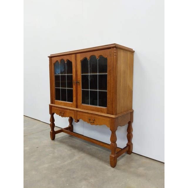 Authentic vintage Danish / Scandinavian Modern oak cabinet / sideboard with stained glass doors. This piece is in...