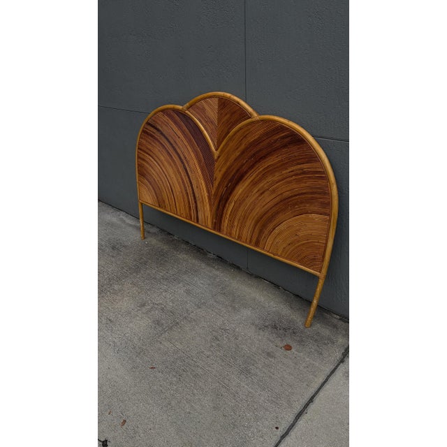 This is a beautiful double arched pencil reed headboard. It has a stunning combination of coloring to the reed. These type...