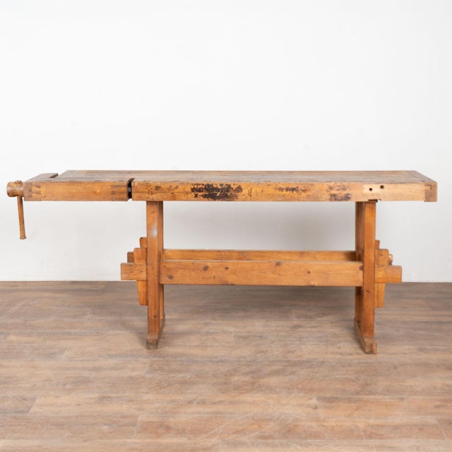 The worn patina of this authentic carpenter's workbench is a reflection of its age and years of use. Every ding, scratch,...
