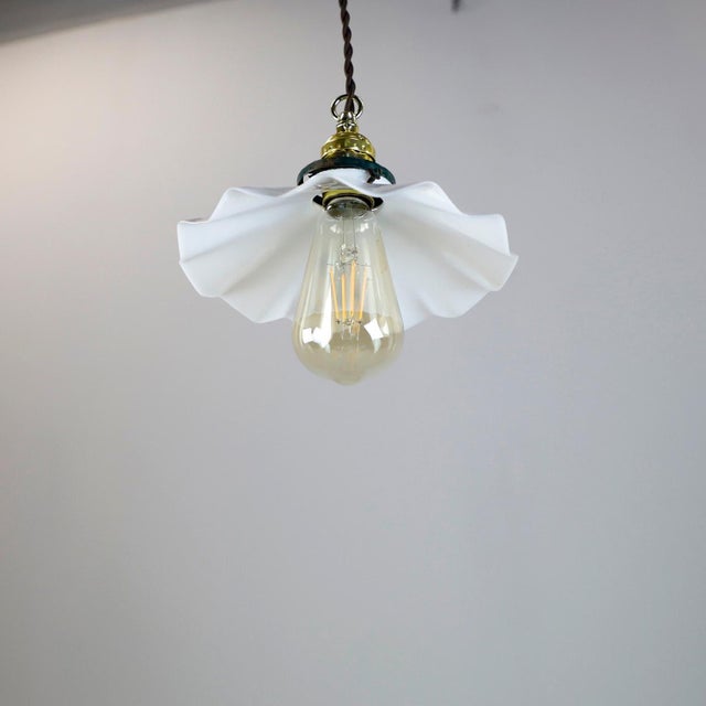 We offer this Milk Glass Vintage Industrial Pendant Light. Glass shade in excellent condition. The electrical system is...