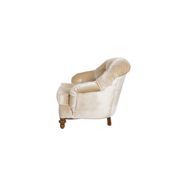 This C. R. Laine button-tufted upholstered armchair, crafted in 2002, presents a refined Regency style. Manufactured in...