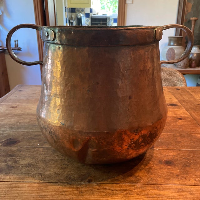 This is an incredible piece! This is a large hand forged copper vessel that could be used for so many things. It is...